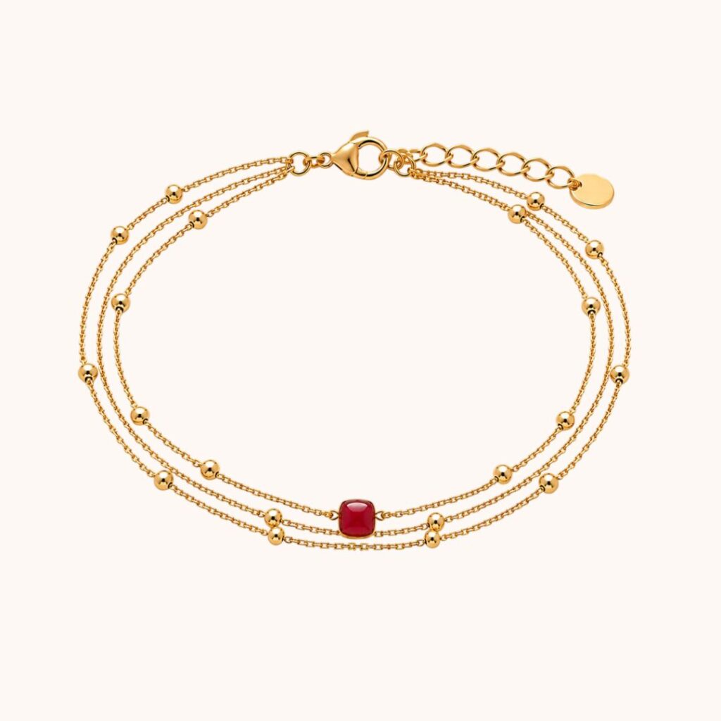 Bracelet Carole triple chaîne – Acier Doré – Grenat